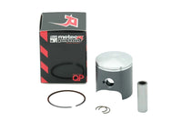 A piston for a KTM motorcycle, including the piston itself, piston rings, a wrist pin, and a box with the KTM logo on it.